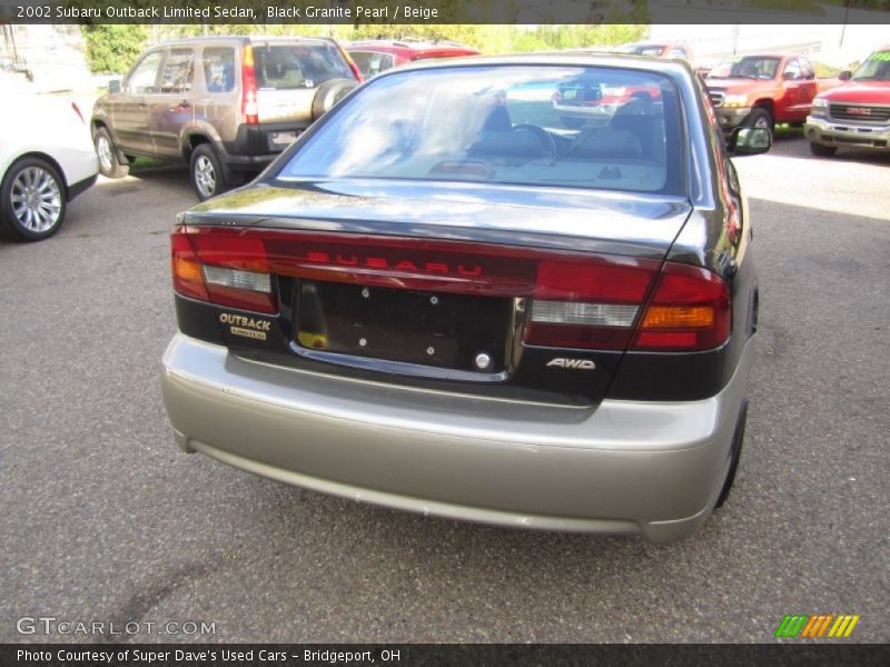 Black Granite Pearl / Beige 2002 Subaru Outback Limited Sedan