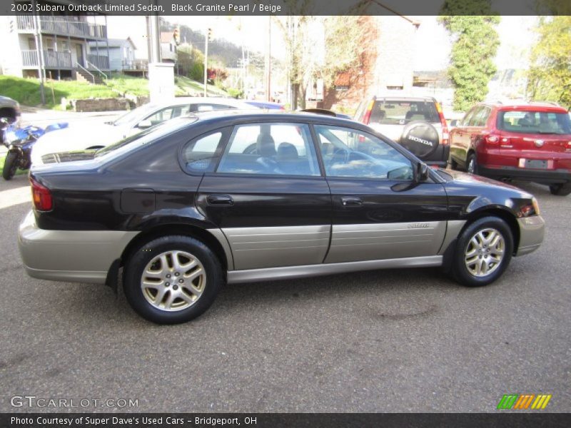 Black Granite Pearl / Beige 2002 Subaru Outback Limited Sedan