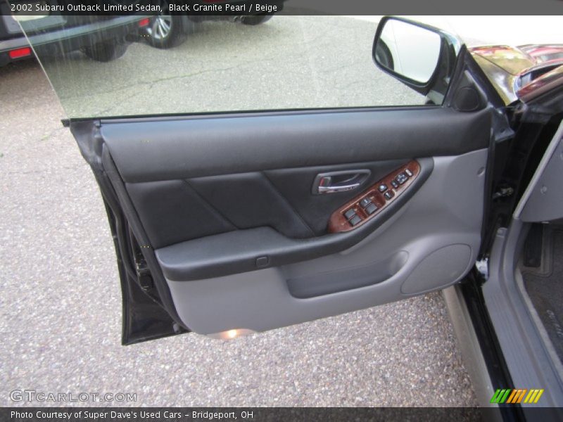 Black Granite Pearl / Beige 2002 Subaru Outback Limited Sedan