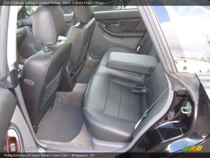 Black Granite Pearl / Beige 2002 Subaru Outback Limited Sedan