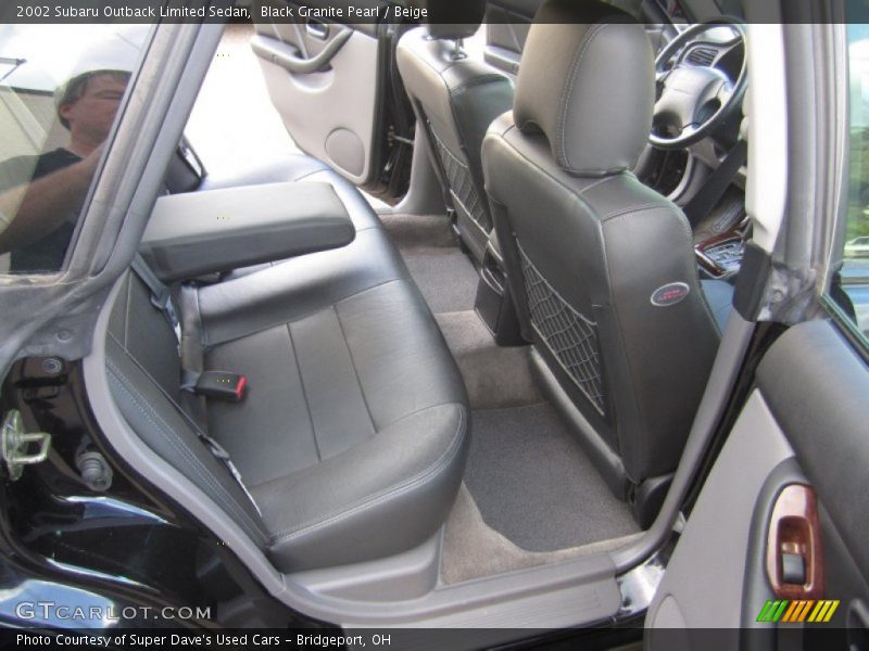 Black Granite Pearl / Beige 2002 Subaru Outback Limited Sedan