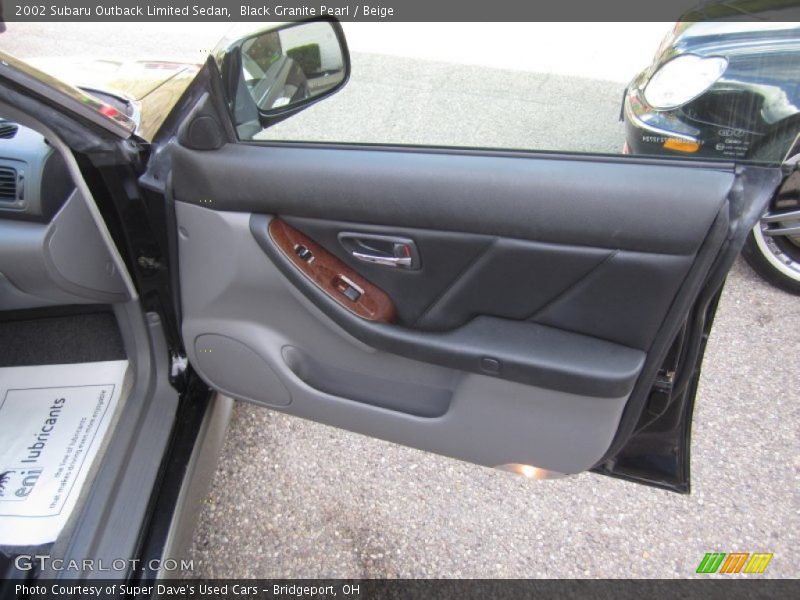 Black Granite Pearl / Beige 2002 Subaru Outback Limited Sedan
