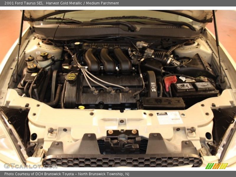 Harvest Gold Metallic / Medium Parchment 2001 Ford Taurus SES