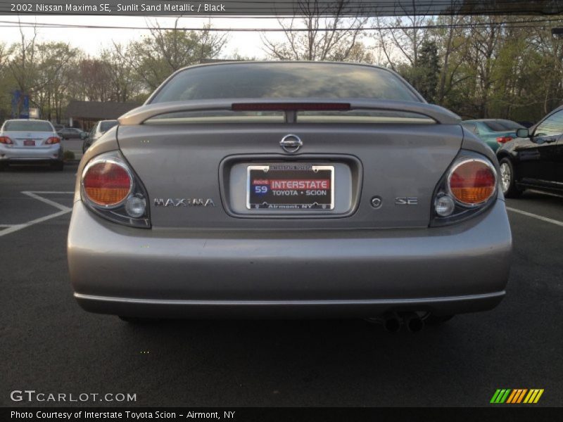 Sunlit Sand Metallic / Black 2002 Nissan Maxima SE