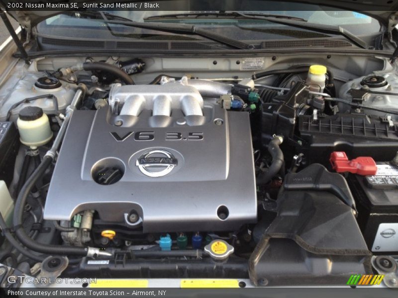 Sunlit Sand Metallic / Black 2002 Nissan Maxima SE