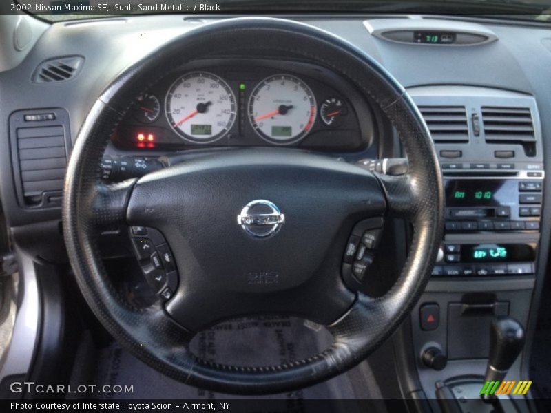 Sunlit Sand Metallic / Black 2002 Nissan Maxima SE