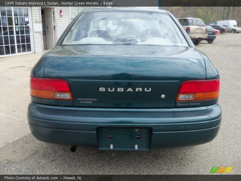 Hunter Green Metallic / Beige 1995 Subaru Impreza L Sedan