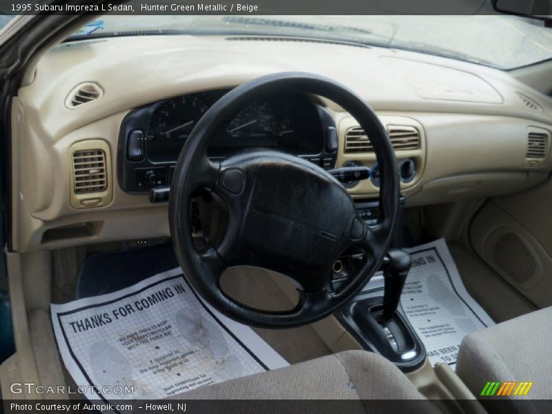 Hunter Green Metallic / Beige 1995 Subaru Impreza L Sedan