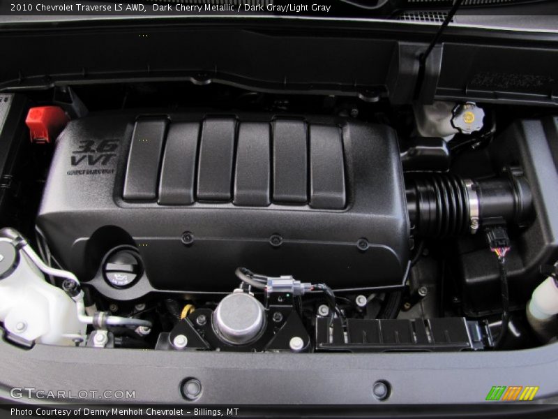 Dark Cherry Metallic / Dark Gray/Light Gray 2010 Chevrolet Traverse LS AWD