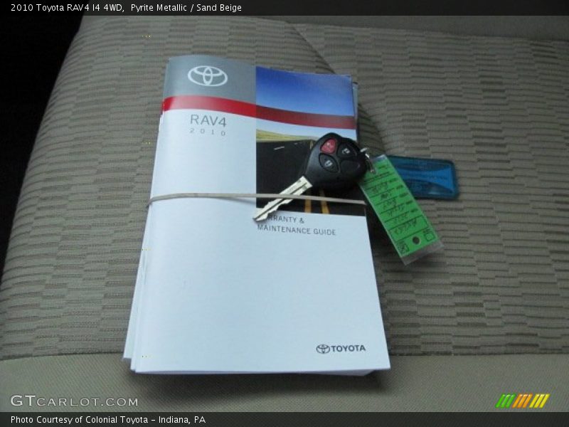Pyrite Metallic / Sand Beige 2010 Toyota RAV4 I4 4WD