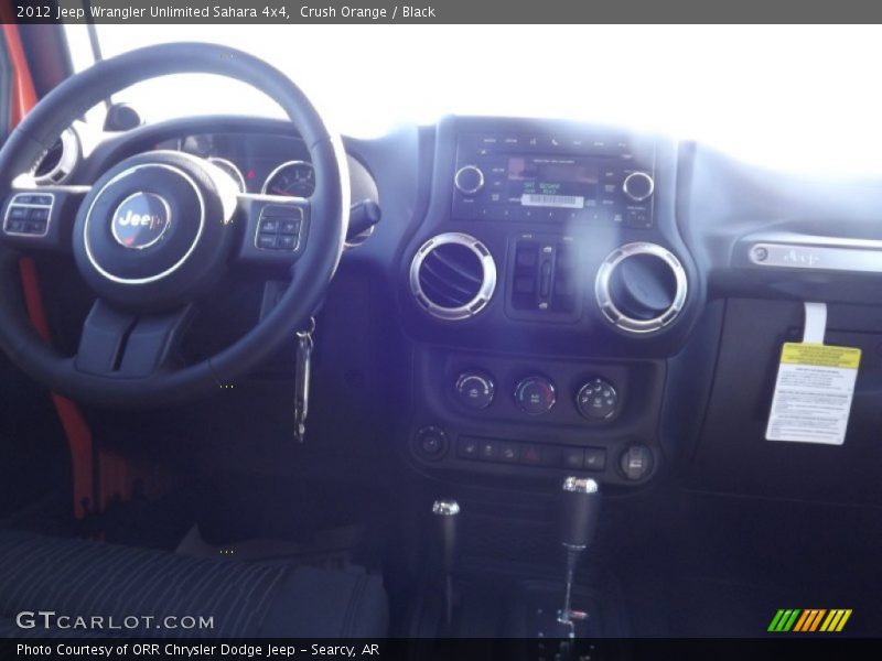 Crush Orange / Black 2012 Jeep Wrangler Unlimited Sahara 4x4