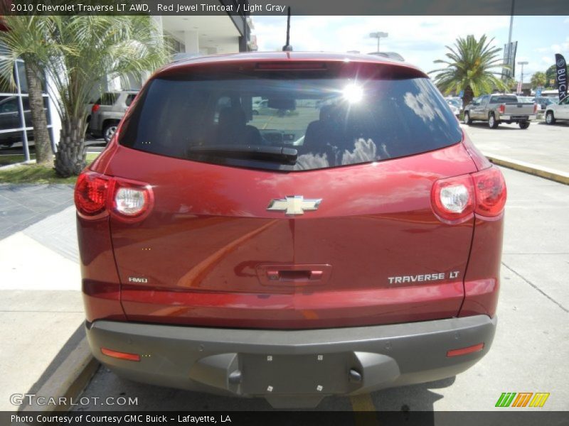 Red Jewel Tintcoat / Light Gray 2010 Chevrolet Traverse LT AWD