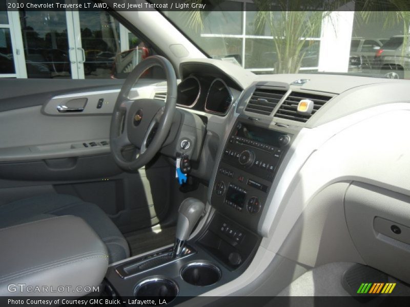Red Jewel Tintcoat / Light Gray 2010 Chevrolet Traverse LT AWD