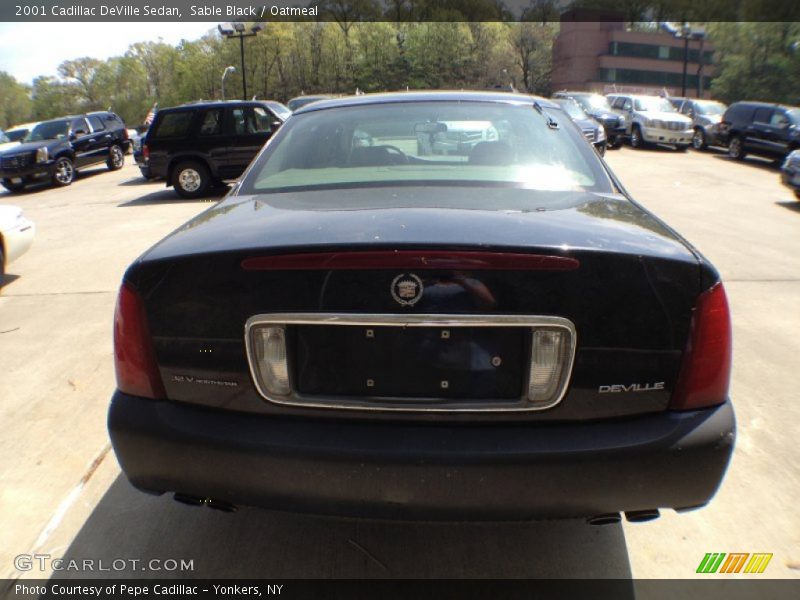 Sable Black / Oatmeal 2001 Cadillac DeVille Sedan