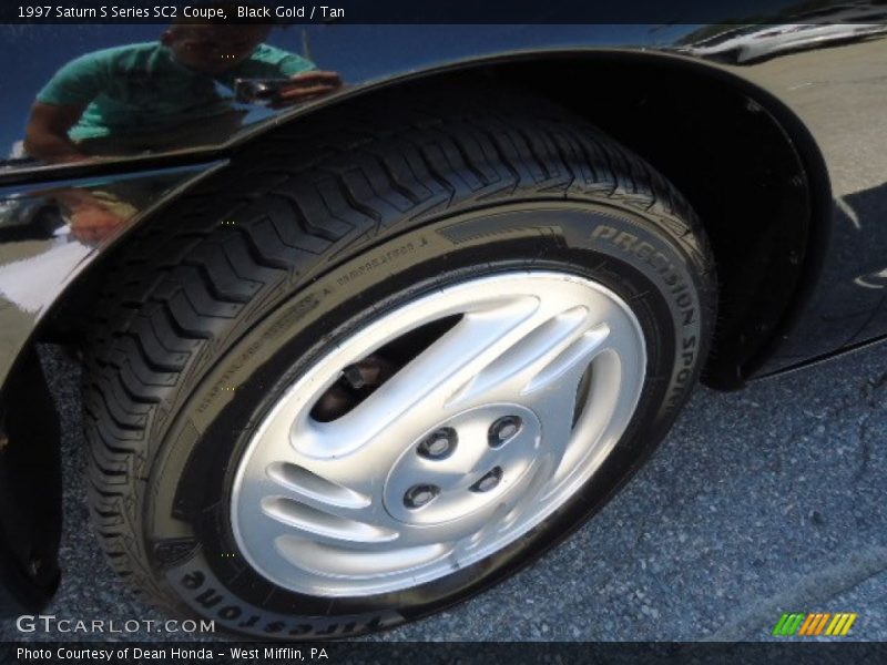 Black Gold / Tan 1997 Saturn S Series SC2 Coupe