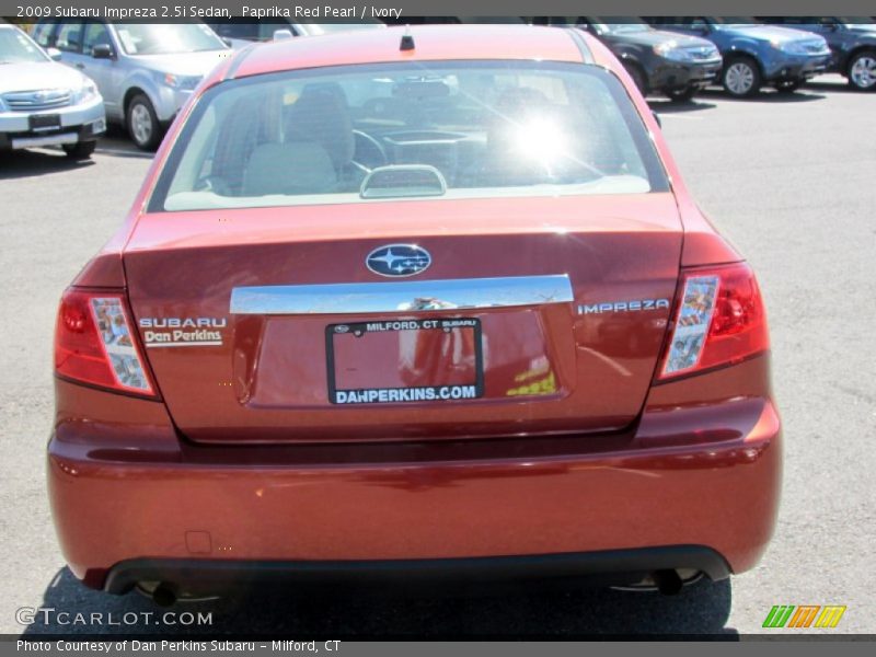 Paprika Red Pearl / Ivory 2009 Subaru Impreza 2.5i Sedan