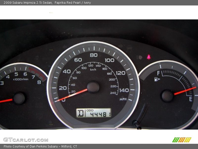 Paprika Red Pearl / Ivory 2009 Subaru Impreza 2.5i Sedan