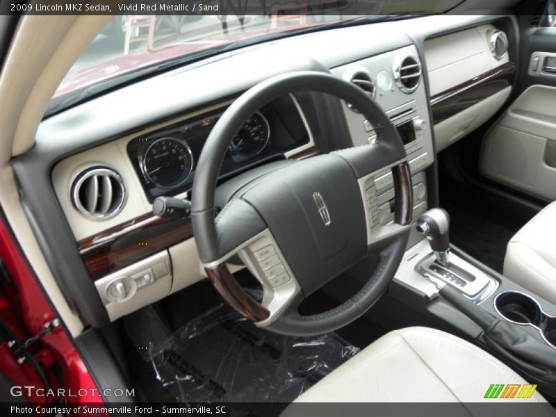 Vivid Red Metallic / Sand 2009 Lincoln MKZ Sedan