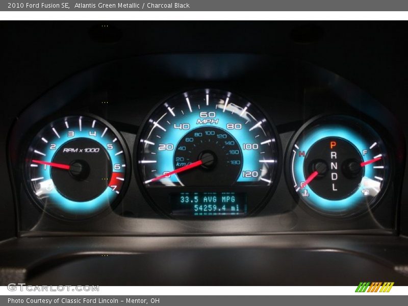 Atlantis Green Metallic / Charcoal Black 2010 Ford Fusion SE