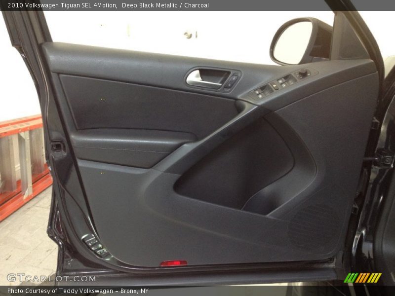 Deep Black Metallic / Charcoal 2010 Volkswagen Tiguan SEL 4Motion