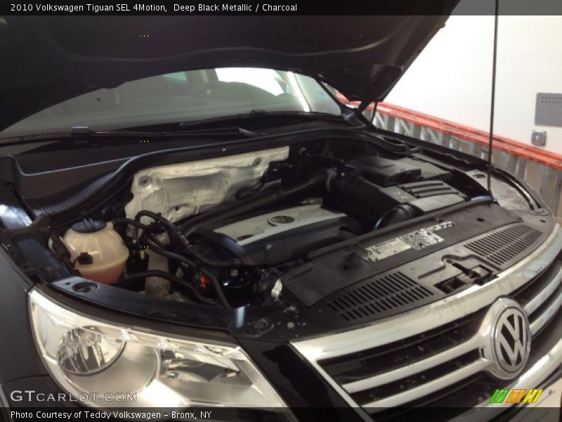 Deep Black Metallic / Charcoal 2010 Volkswagen Tiguan SEL 4Motion