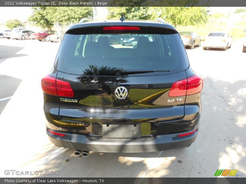 Deep Black Metallic / Beige 2012 Volkswagen Tiguan SE