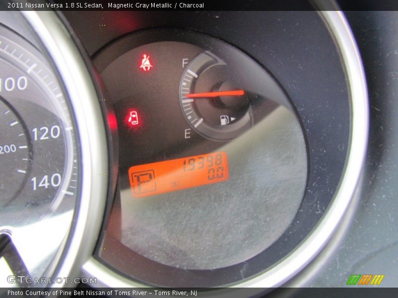 Magnetic Gray Metallic / Charcoal 2011 Nissan Versa 1.8 SL Sedan