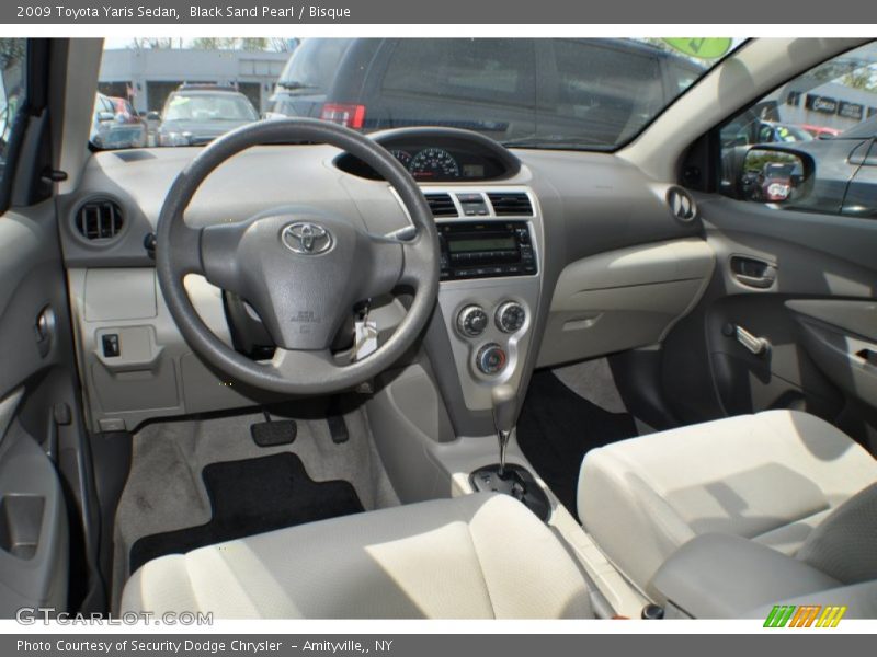 Black Sand Pearl / Bisque 2009 Toyota Yaris Sedan