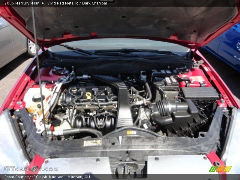 Vivid Red Metallic / Dark Charcoal 2006 Mercury Milan I4