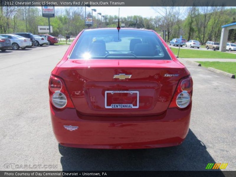 Victory Red / Jet Black/Dark Titanium 2012 Chevrolet Sonic LS Sedan