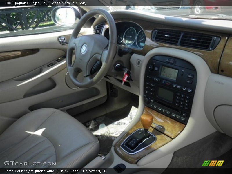 Topaz Metallic / Ivory 2002 Jaguar X-Type 2.5