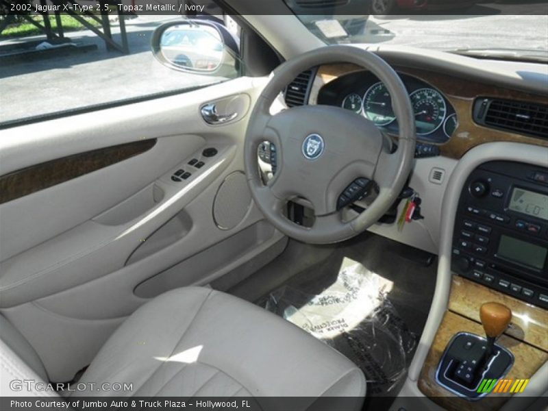 Topaz Metallic / Ivory 2002 Jaguar X-Type 2.5