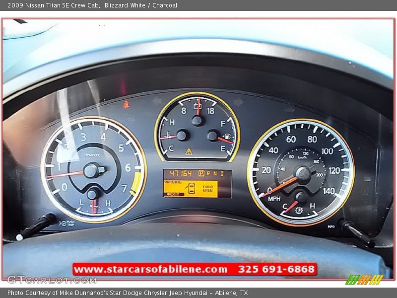 Blizzard White / Charcoal 2009 Nissan Titan SE Crew Cab