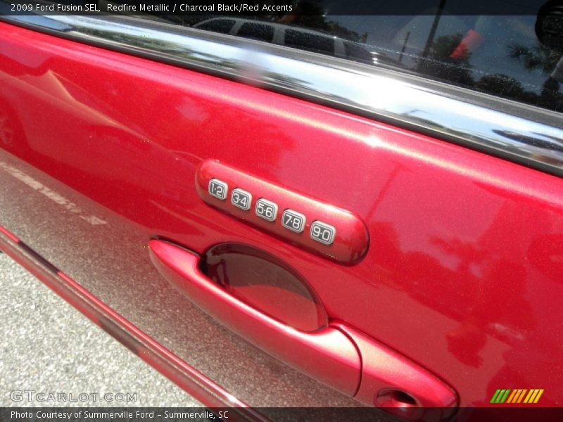 Redfire Metallic / Charcoal Black/Red Accents 2009 Ford Fusion SEL