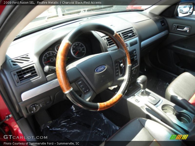 Redfire Metallic / Charcoal Black/Red Accents 2009 Ford Fusion SEL