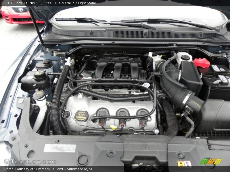 Steel Blue Metallic / Light Stone 2010 Ford Taurus SEL