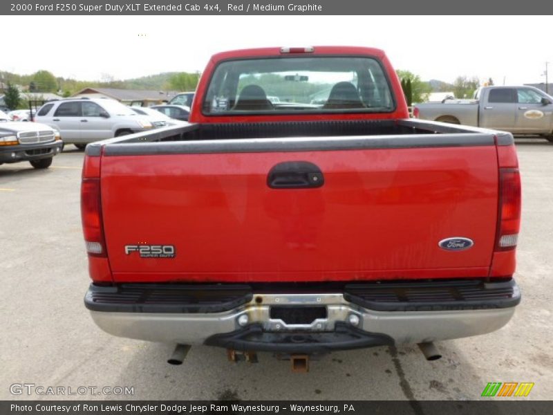 Red / Medium Graphite 2000 Ford F250 Super Duty XLT Extended Cab 4x4