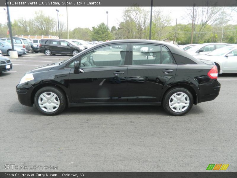 Super Black / Charcoal 2011 Nissan Versa 1.8 S Sedan
