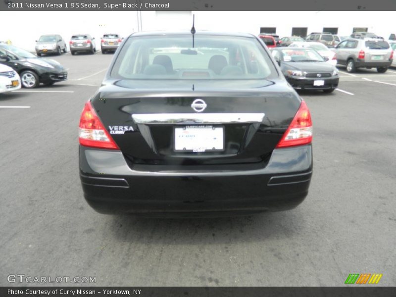 Super Black / Charcoal 2011 Nissan Versa 1.8 S Sedan