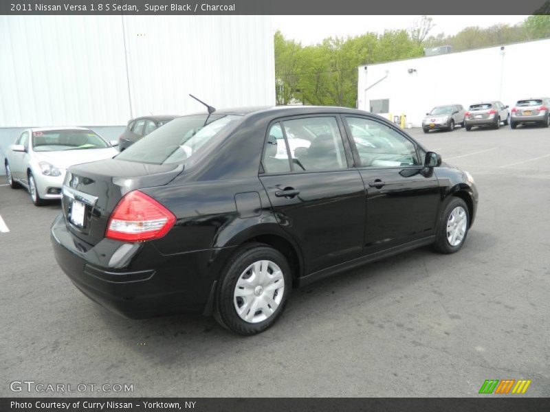 Super Black / Charcoal 2011 Nissan Versa 1.8 S Sedan