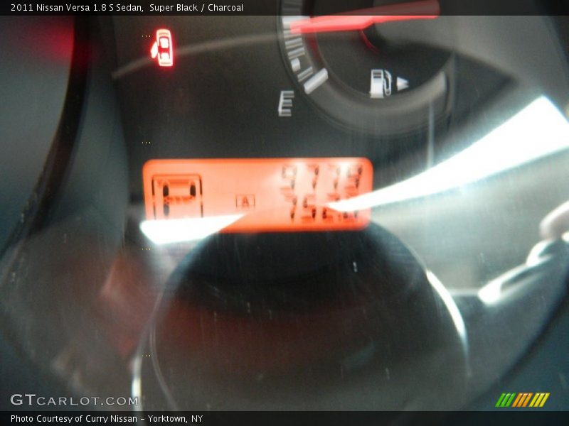 Super Black / Charcoal 2011 Nissan Versa 1.8 S Sedan