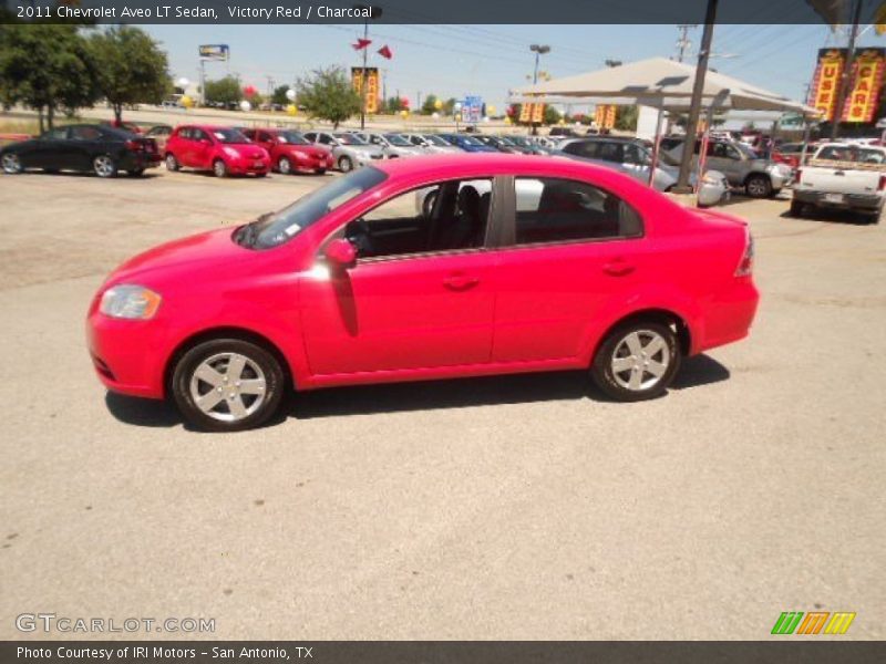 Victory Red / Charcoal 2011 Chevrolet Aveo LT Sedan