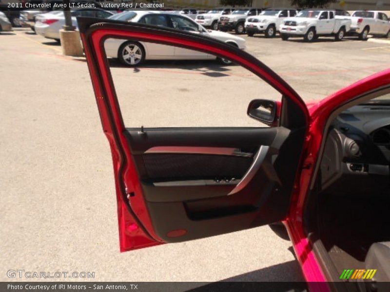 Victory Red / Charcoal 2011 Chevrolet Aveo LT Sedan