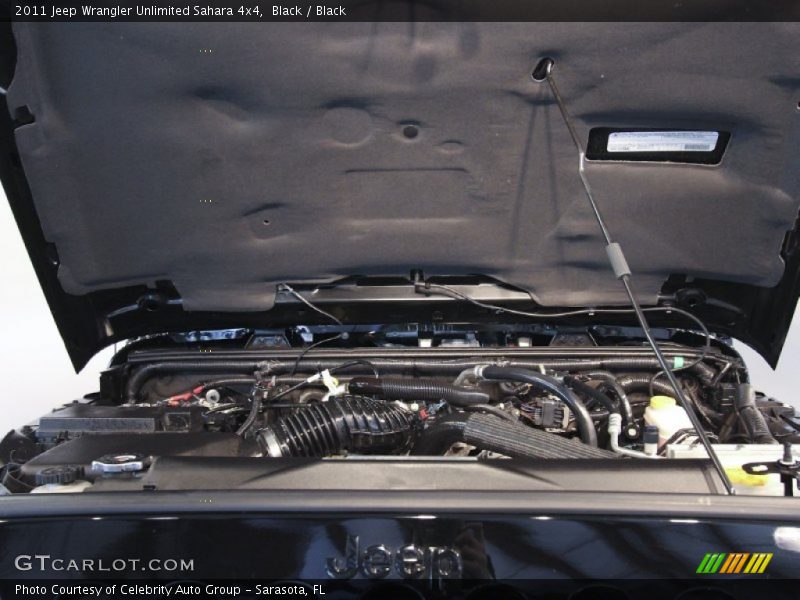 Black / Black 2011 Jeep Wrangler Unlimited Sahara 4x4