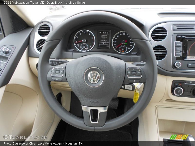 Deep Black Metallic / Beige 2012 Volkswagen Tiguan SE