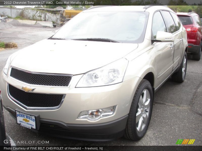 Gold Mist Metallic / Ebony 2012 Chevrolet Traverse LT AWD