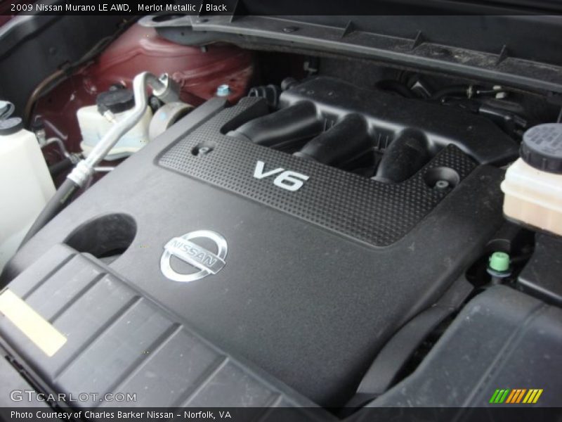 Merlot Metallic / Black 2009 Nissan Murano LE AWD