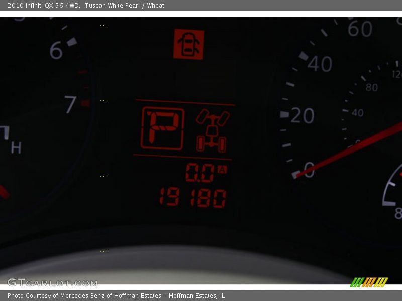 Tuscan White Pearl / Wheat 2010 Infiniti QX 56 4WD