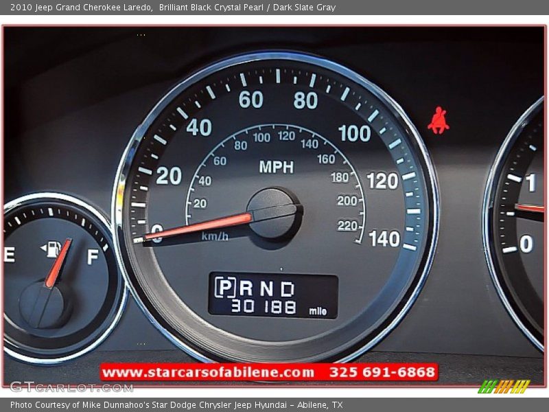 Brilliant Black Crystal Pearl / Dark Slate Gray 2010 Jeep Grand Cherokee Laredo