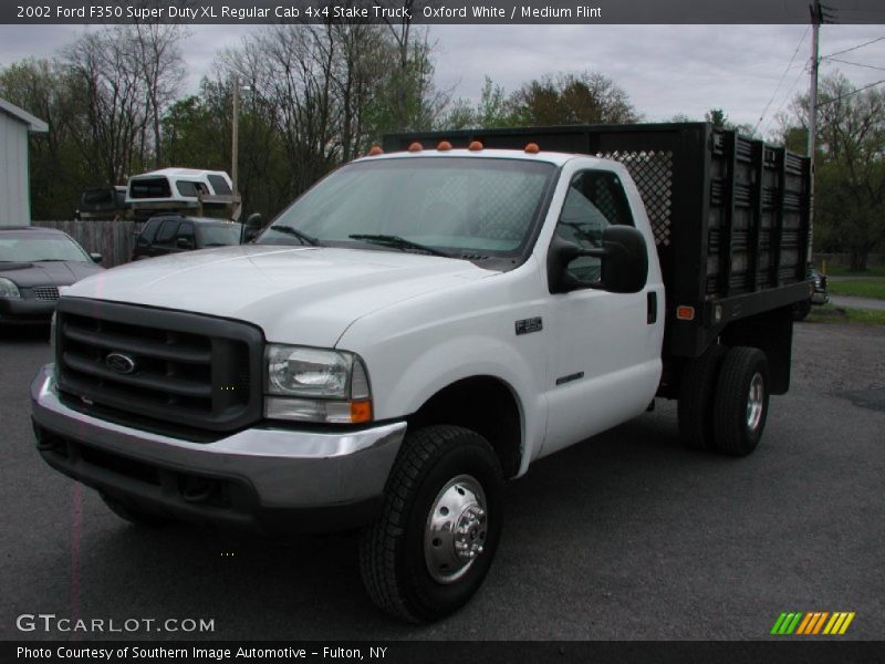 Oxford White / Medium Flint 2002 Ford F350 Super Duty XL Regular Cab 4x4 Stake Truck
